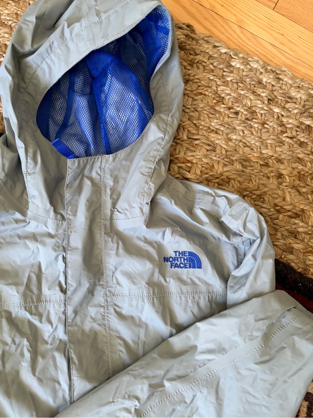 The North Face Light Gray Hooded rain Jacket with Blue Mesh Lining xl